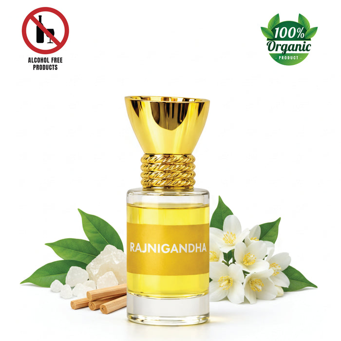 Small glass bottle with gold cap containing amber liquid, labeled Rajnigandha Attar 6ml.