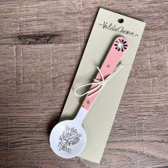 Enamel sugar spoon with wooden handle and laser engraved Fijnbos flower design