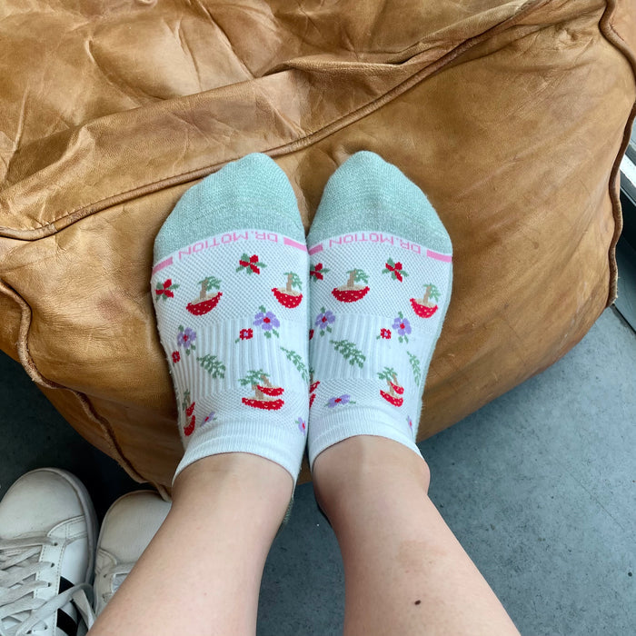 Ankle compression socks with a floral and mushroom pattern, featuring a light blue and white color scheme.