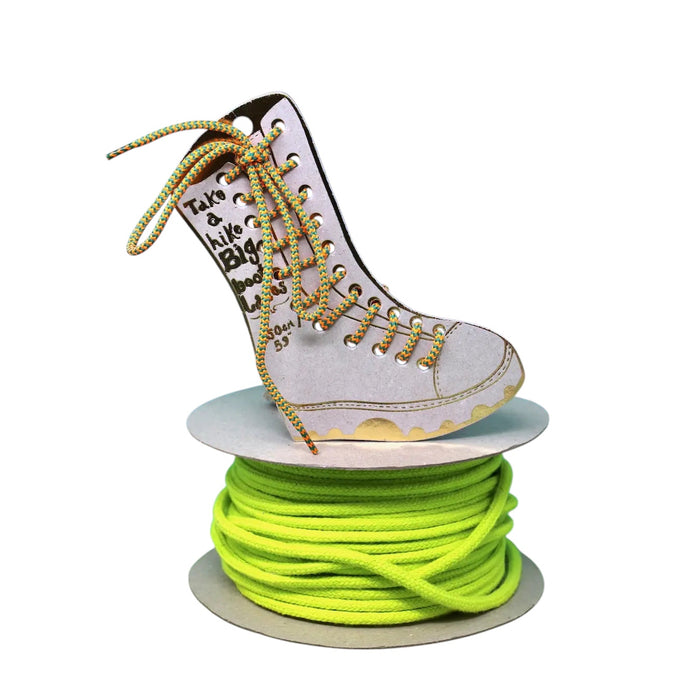 Forager Provisions LTD Ark Colour Design orange and green patterned boot laces displayed on a cardboard boot cutout