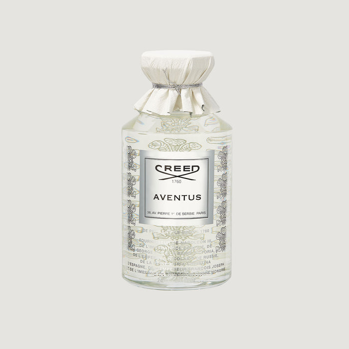 Creed Aventus 240ml flacon with white leather cap and engraved royal heritage text - Front View | Creed Boutique
