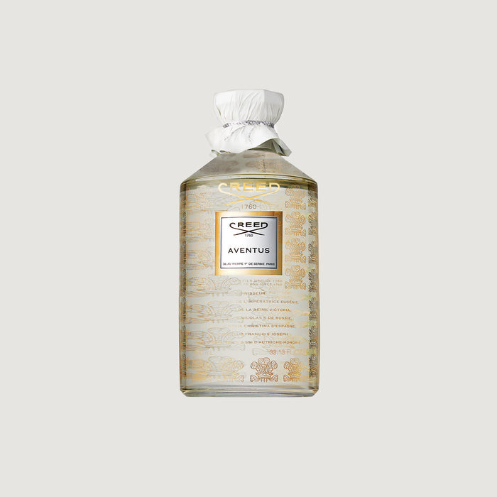 Creed Aventus 980ml collector flacon with gold heritage engravings and white leather-tied cap | Creed Boutique