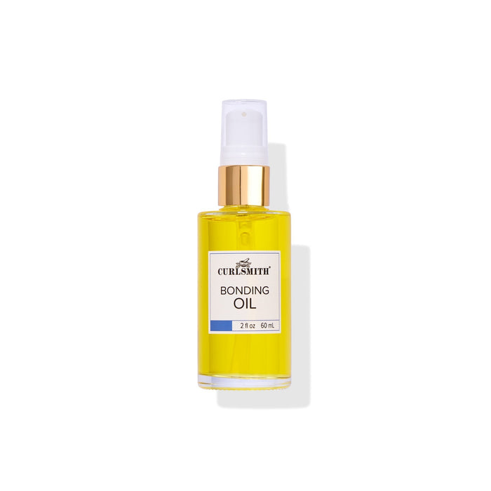 Bottle of Curlsmith bonding oil on a white background