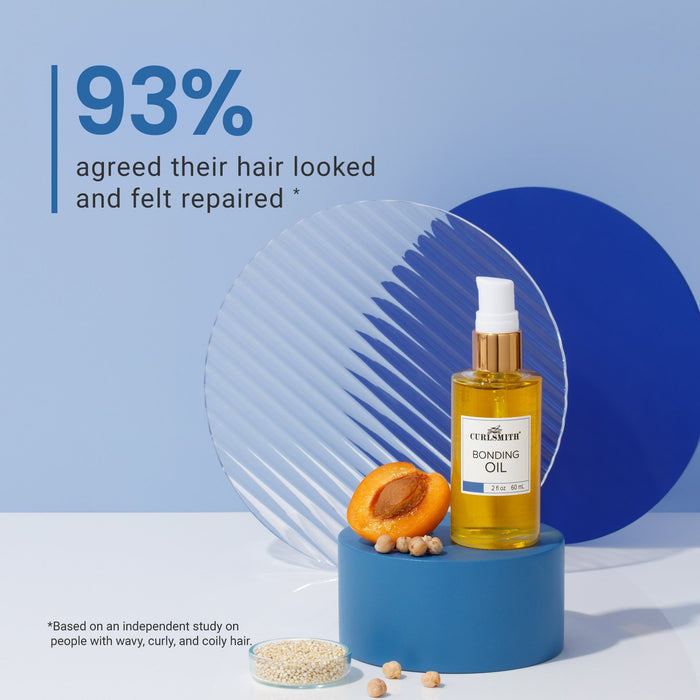 Hair oil bottle with apricot kernel on a blue and white background