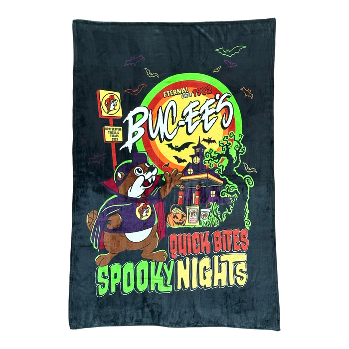 Multi-color blanket - "now serving tricks and treats 2026" text