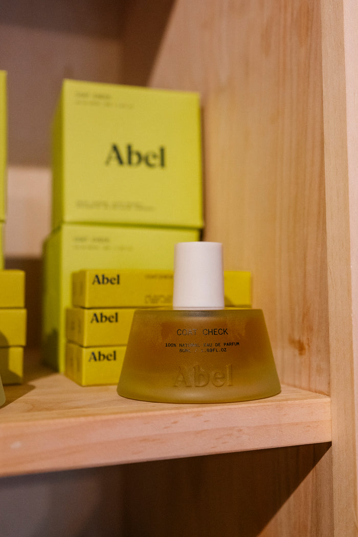 Coat Check | A Dark Smoky Amber