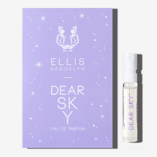Dear Sky 1.5ml Eau De Parfum Vial next to purple Dear Sky Eau De Parfum vial holder card.