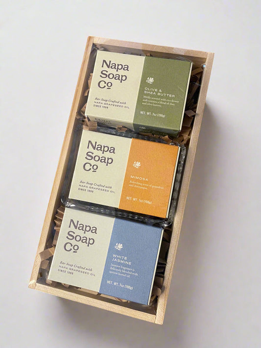 Set of Napa Soap Co. soaps in a wooden box on a white background