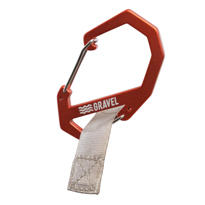 Forager Provisions LTD orange Gravel double-gated aluminum carabiner attached to a grey gear strap