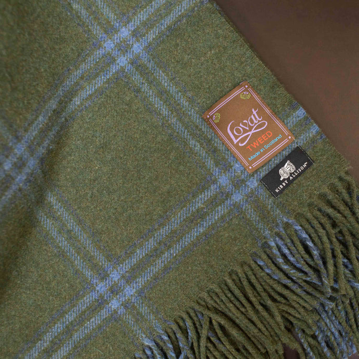 A new Kirby Allison Lovat Mill Suit to Shoot Tweed Wool Throw blanket in green and blue plaid.