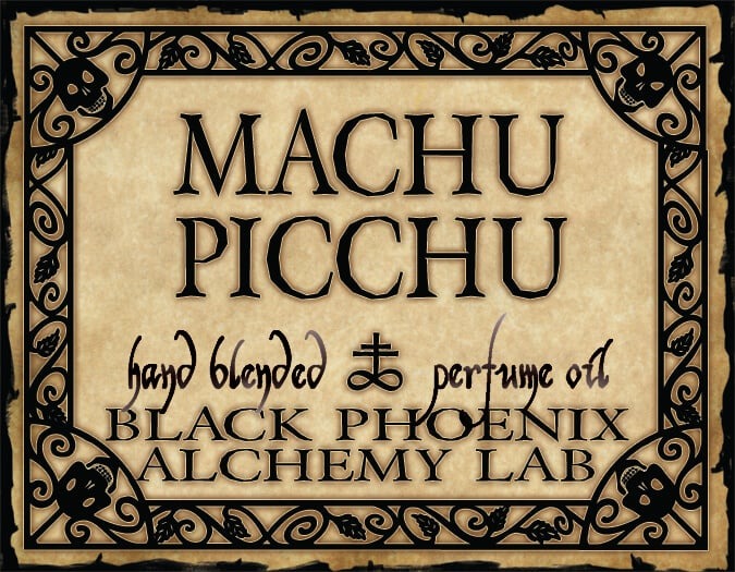 Machu Picchu hand blended perfume oil packaging with decorative border and text.