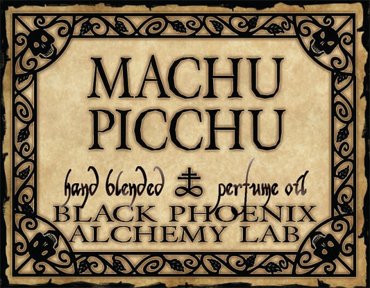Machu Picchu hand blended perfume oil packaging with decorative border and text.