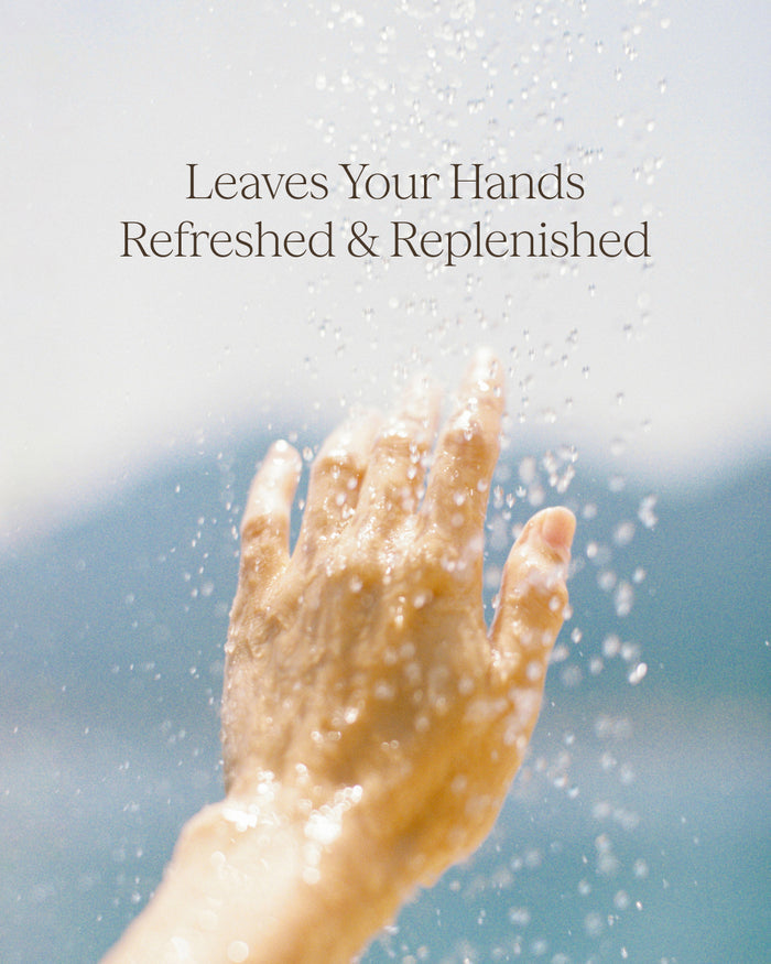 Hand under water with text 'Leaves Your Hands Refreshed & Replenished' for Raw Sugar Hand Wash, designed to help gently cleanse hands with clean ingredients.