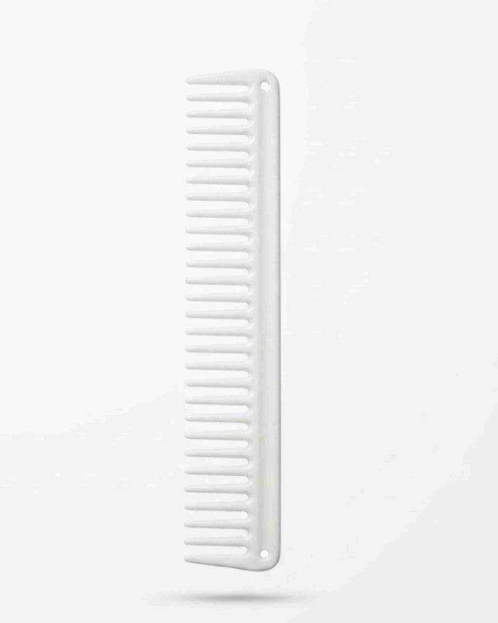 White cutting comb with evenly spaced teeth for long hair grooming