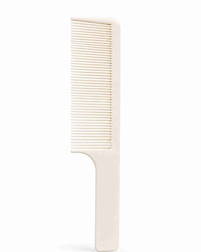 White fine-tooth handle comb with closely spaced teeth for smooth styling.