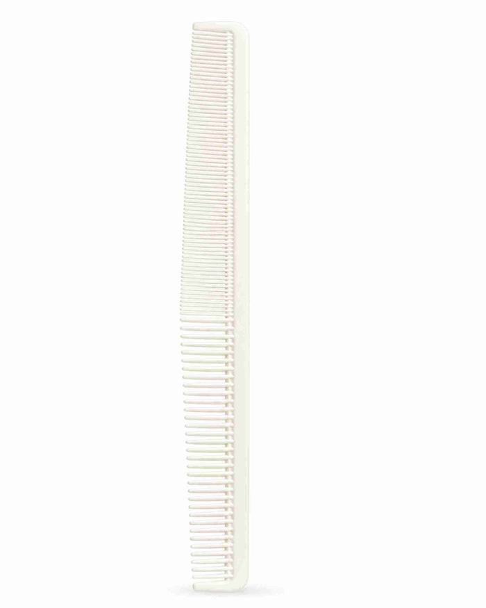 White comb with closely spaced teeth