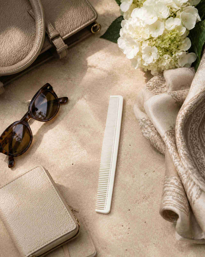 White detangling comb with fine-to-wide tooth pattern