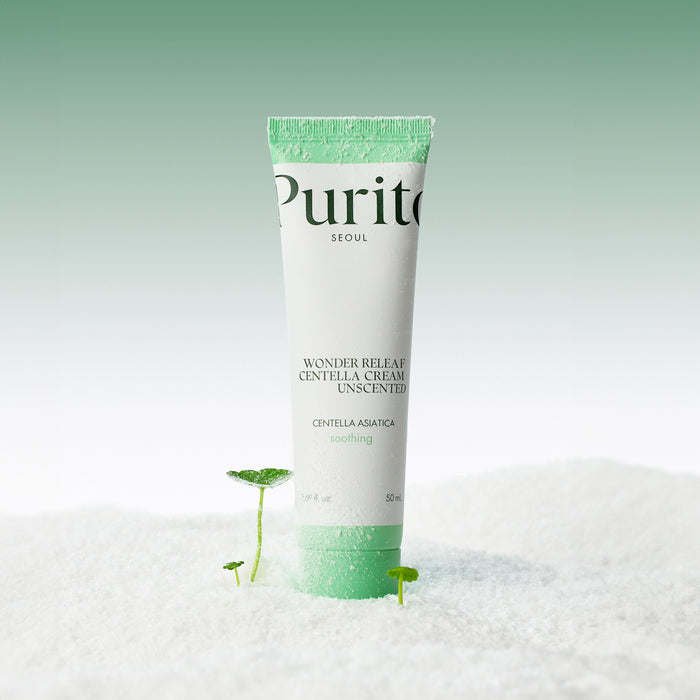 Purito Wonder Releaf Centella Cream 50ml i hvit tube med grønn topp mot snøaktig bakgrunn