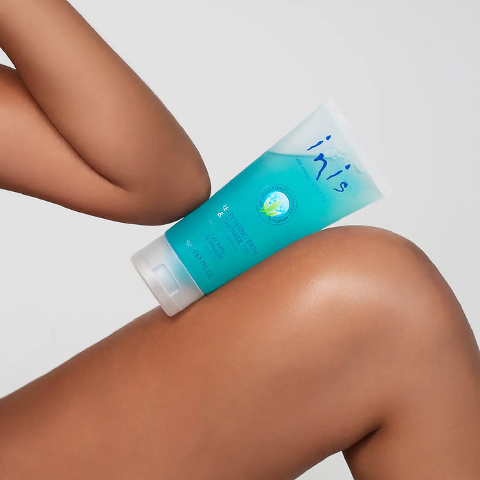 Person holding a blue tube by their arm and leg with a white background