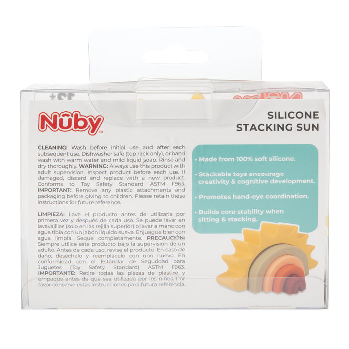 Clear packaging displays the Silicone Stacking Sun Toy, a colorful stackable toy that supports hand-eye coordination and cognitive development. Packaging text highlights cleaning instructions and soft pastel silicone sun shapes inside.