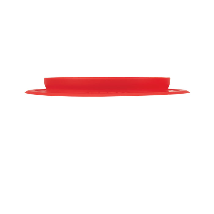 The Nuby Sure Grip Miracle Mat, a flat round red silicone baby plate lid, is shown from the side against a white background.