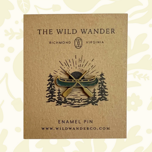 Forager Provisions LTD The Wild Wander canoe enamel pin with green enamel and gold plating on a kraft backing card.