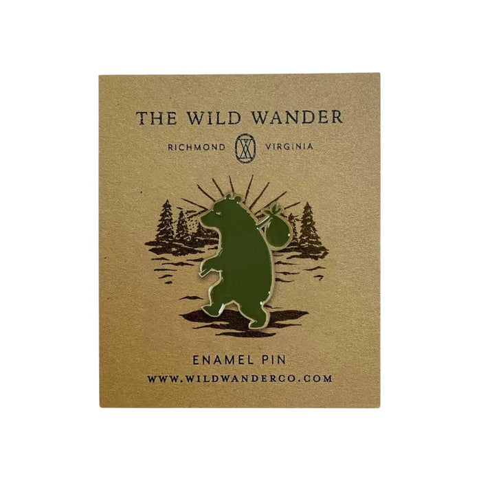 Forager Provisions LTD Wandering Bear enamel pin featuring a green bear with a bindle on a branded backing card.