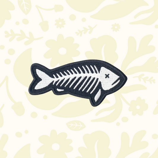 Forager Provisions LTD fish skeleton embroidered patch in black and white, suitable for iron-on or sew-on application.