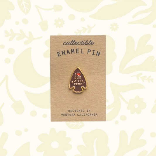 Forager Provisions LTD National Parks arrowhead enamel pin on a branded cardboard backing card.