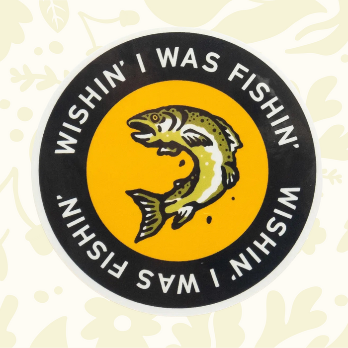 Forager Provisions LTD round vinyl sticker featuring a jumping fish and the text Wishin I Was Fishin on a yellow background