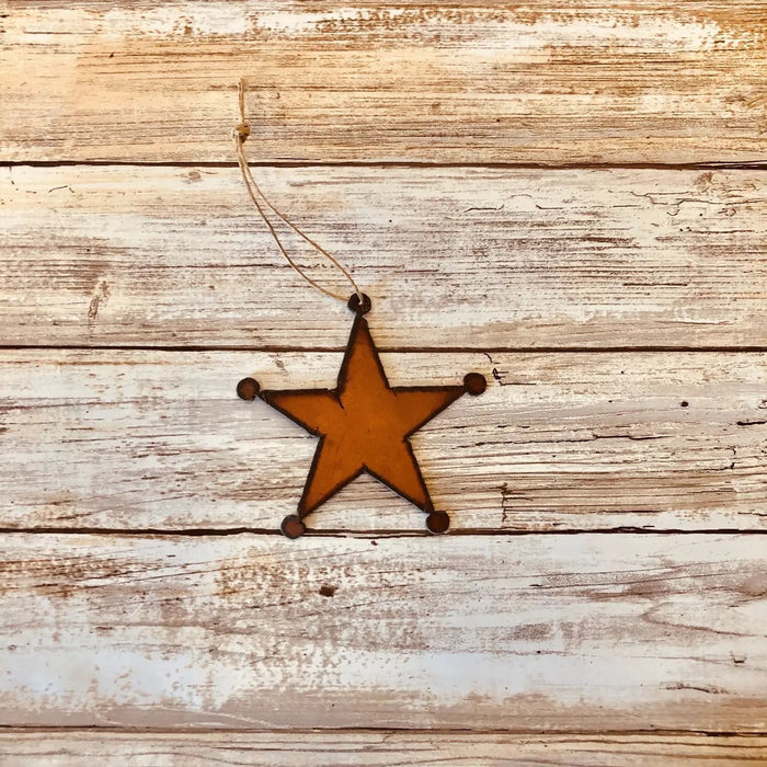 Universal Ironworks Sheriff Badge Hanging Decoration brings Western flair to rustic, farmhouse, or whitewashed wood home decor.