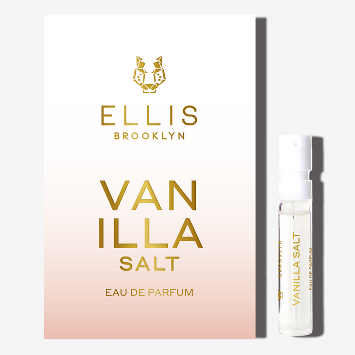 Vanilla Salt 1.5ml Eau De Parfum Vial next to white and pink ombre Vanilla Salt Eau De Parfum vial holder card.